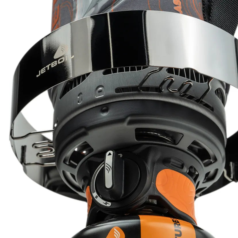 Close-up of a black and orange power tool with 'Jetboil' branding.