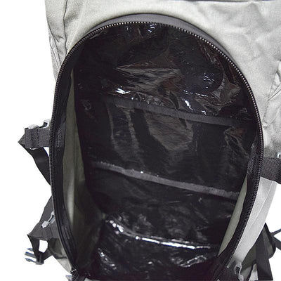 The outer-facing, zippered pocket of the Stone Glacier Sky 5900 Backpack with the zipper undone.