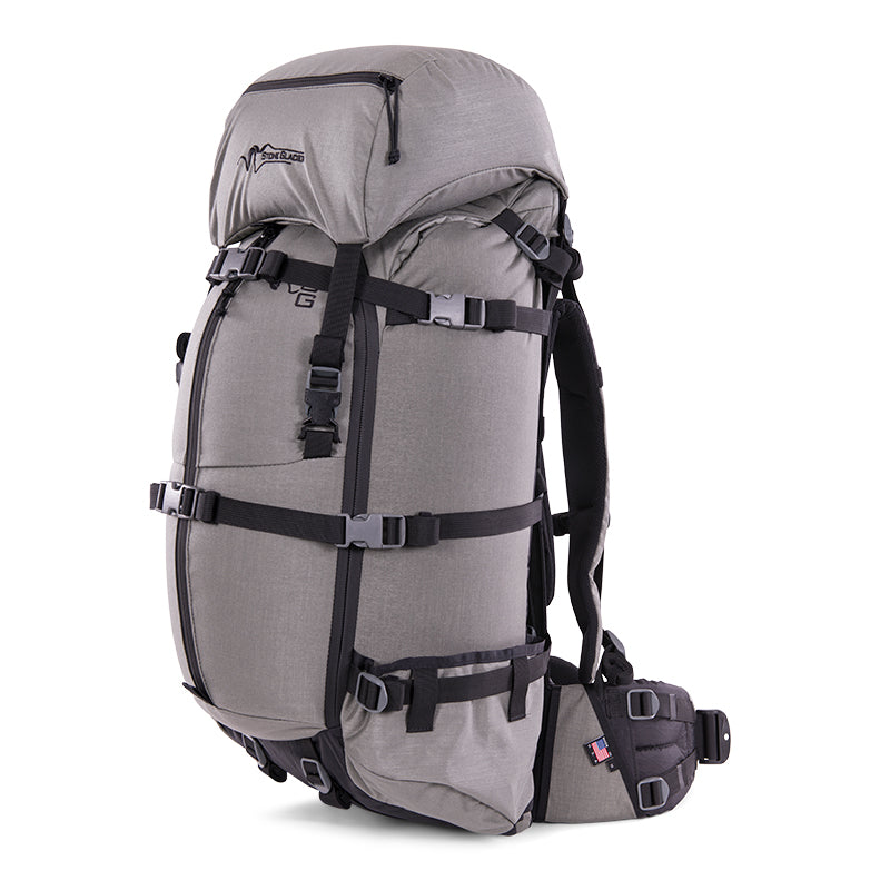 The Stone Glacier Sky 5900 Backpack in foliage, compressed slightly for day use or multi day use.